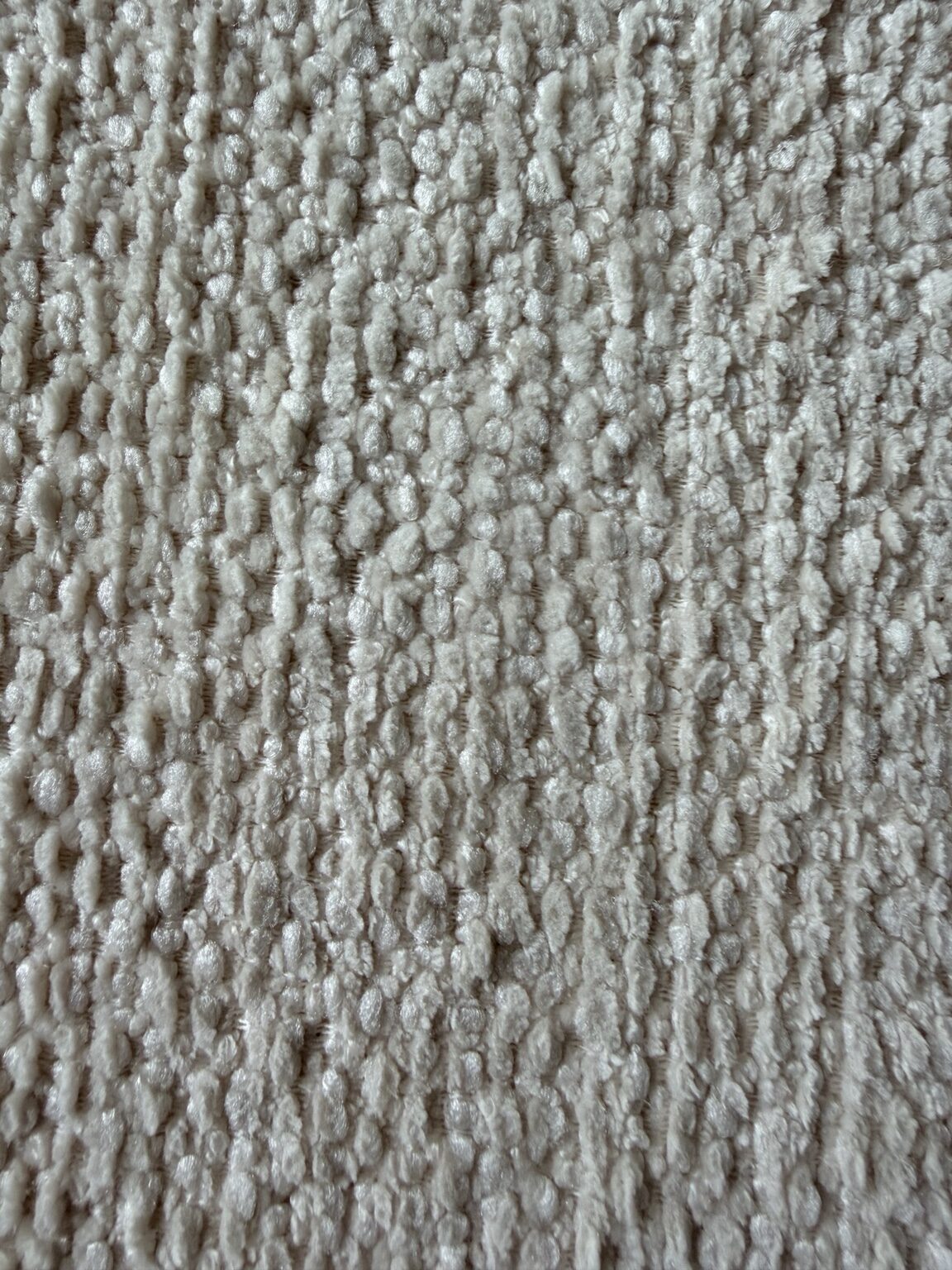 Close-up of the looped polyester bouclé upholstery fabric