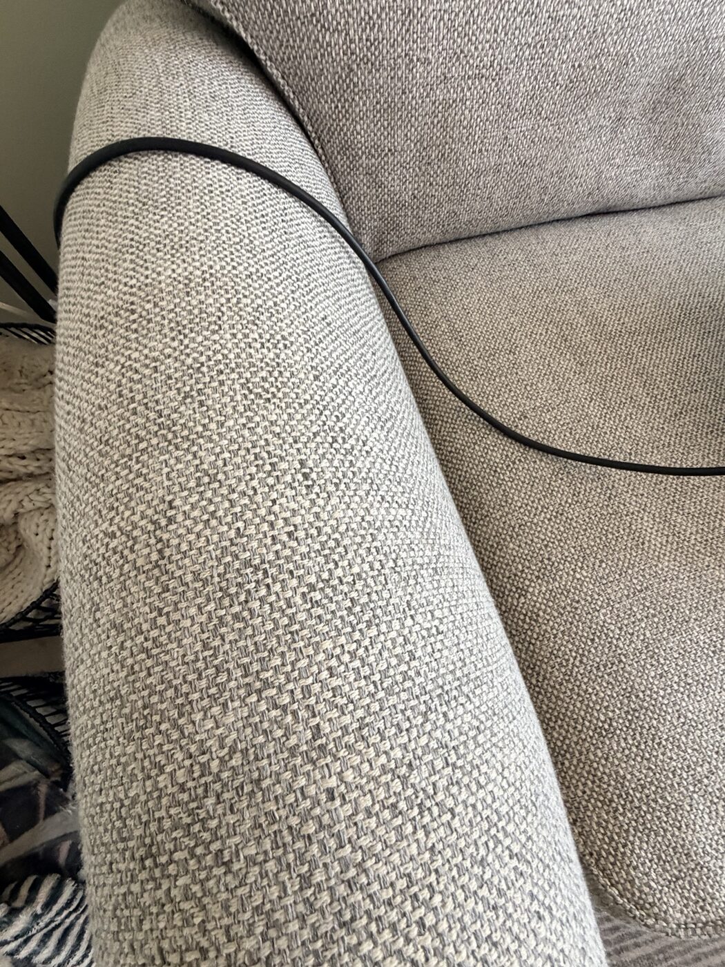 Clean sofa arm after professional stain treatment