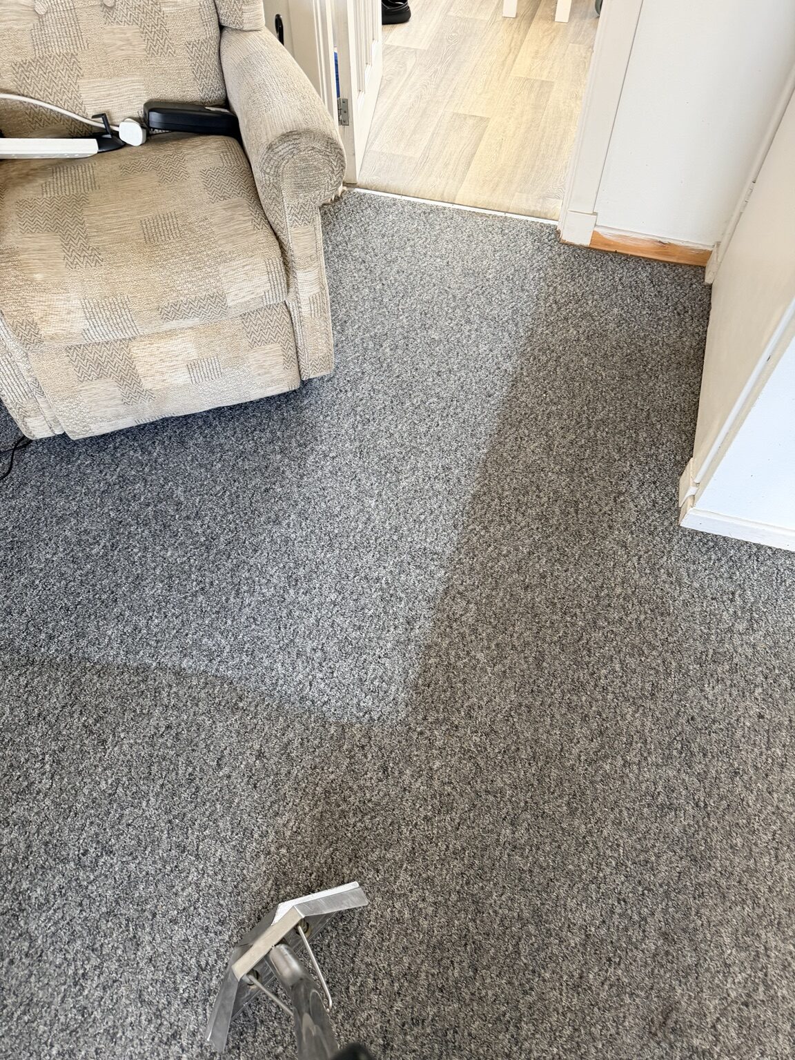 In-progress clean showing the difference on polypropylene carpet