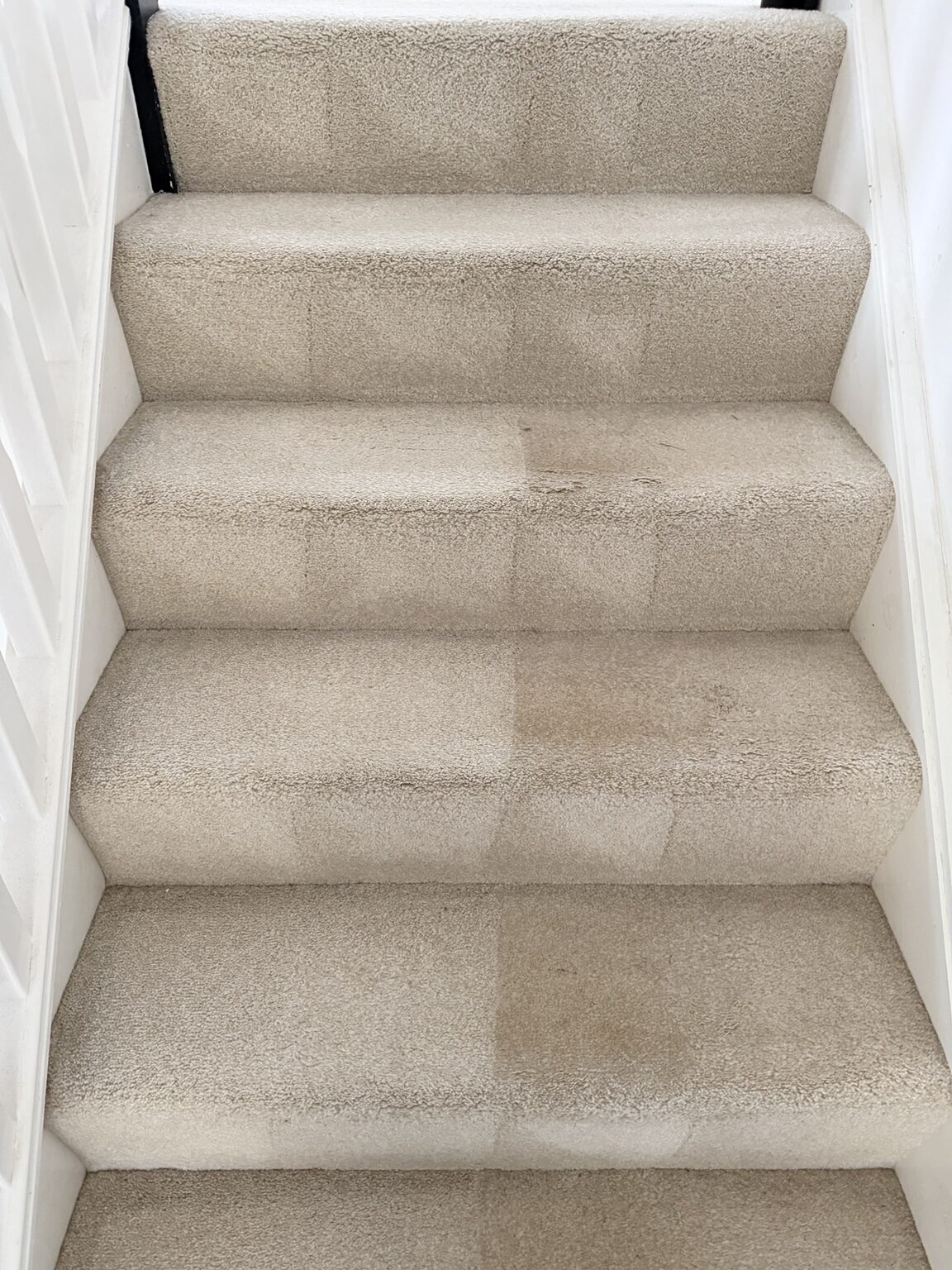 Half-cleaned comparison on polyester stairs in Heartlands