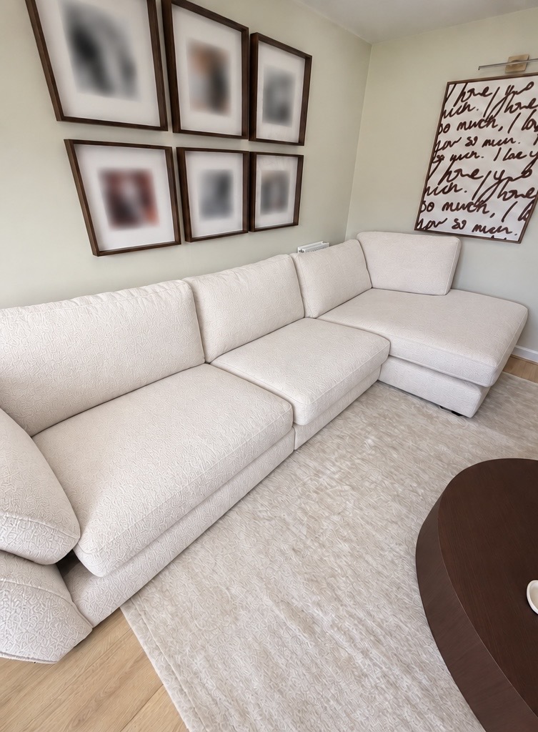Finished light-coloured bouclé sofa in West Calder after professional cleaning