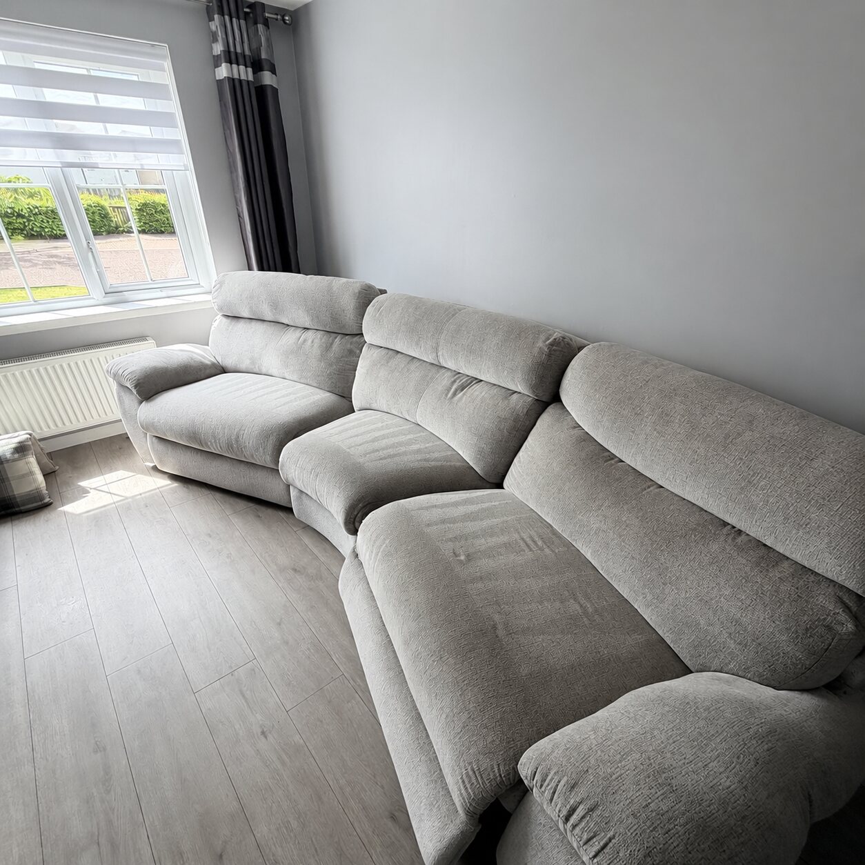 Professionally cleaned polyester corner sofa in West Lothian